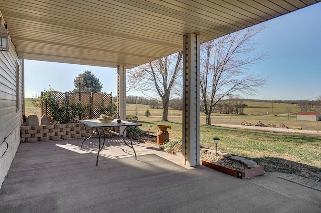 view of patio with a rural view