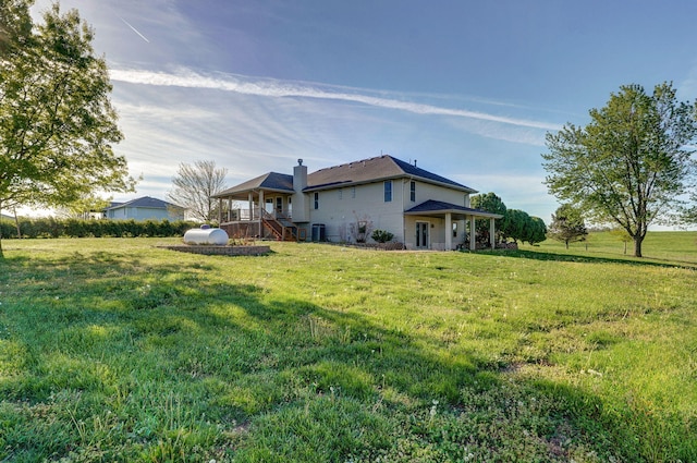10071 W Farm Road 48, Walnut Grove, MO 65770 - back of property with a yard and a chimney