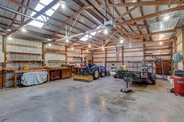 10071 W Farm Road 48, Walnut Grove, MO 65770 - garage featuring a workshop area and a garage door opener