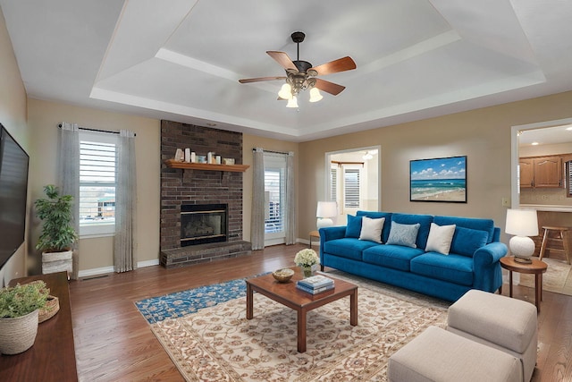 10071 W Farm Road 48, Walnut Grove, MO 65770 - living room featuring a raised ceiling and wood finished floors
