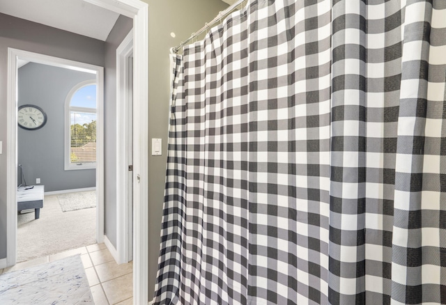 bathroom featuring tile patterned flooring