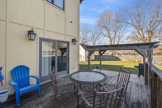 wooden deck with a pergola and a yard