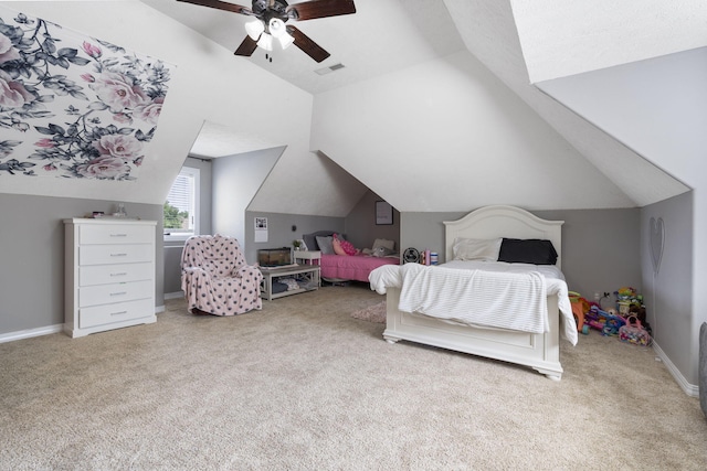 carpeted bedroom featuring vaulted ceiling and ceiling fan