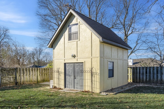 view of outdoor structure featuring a yard