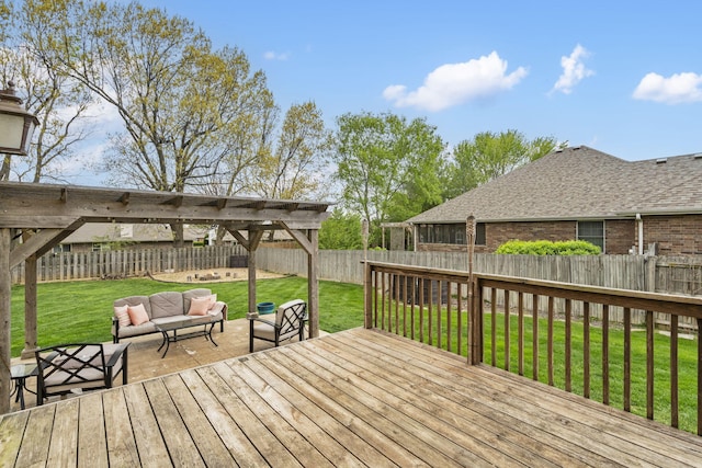 wooden deck featuring a pergola, a fenced backyard, outdoor lounge area, and a yard