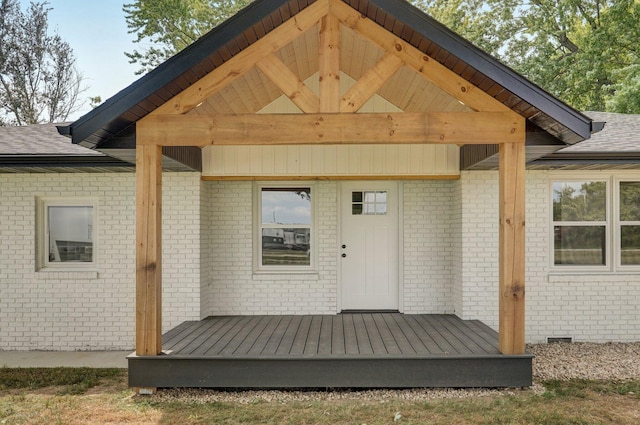 doorway to property featuring a deck