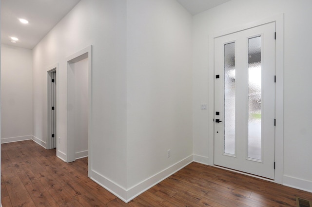 2423 E Cardinal St, Springfield, MO 65804 - foyer entrance featuring visible vents, baseboards, and wood-type flooring