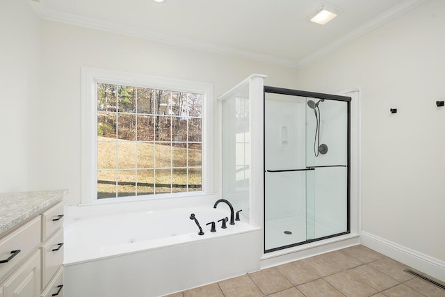 bathroom featuring tile patterned flooring, vanity, separate shower and tub, and ornamental molding