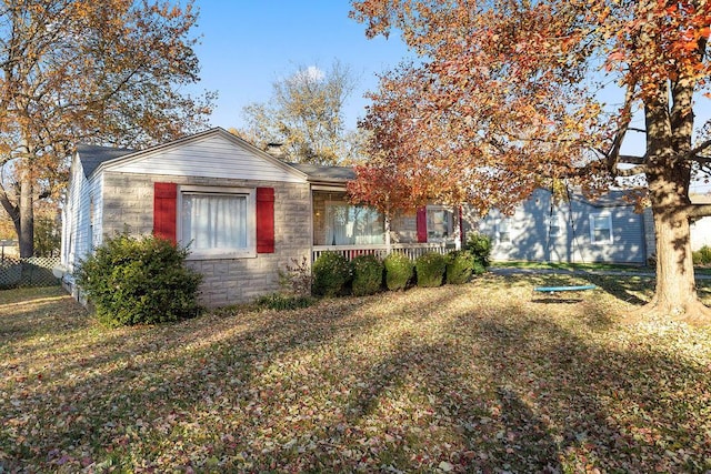 view of front of property with a front lawn