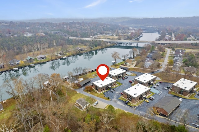 birds eye view of property featuring a water view