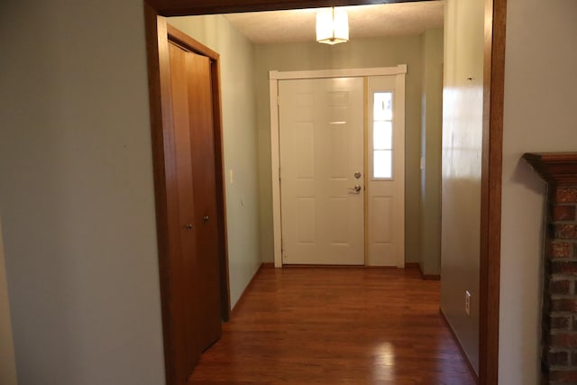 entrance foyer featuring dark hardwood / wood-style floors