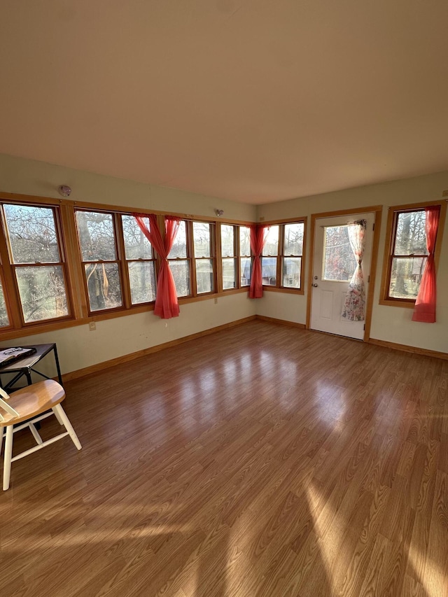 interior space with hardwood / wood-style flooring