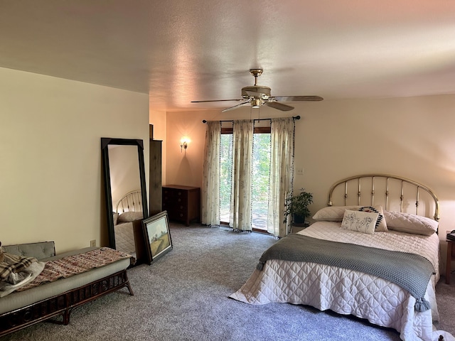 bedroom with ceiling fan, carpet floors, and access to outside