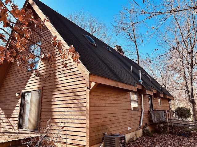 view of home's exterior with central air condition unit