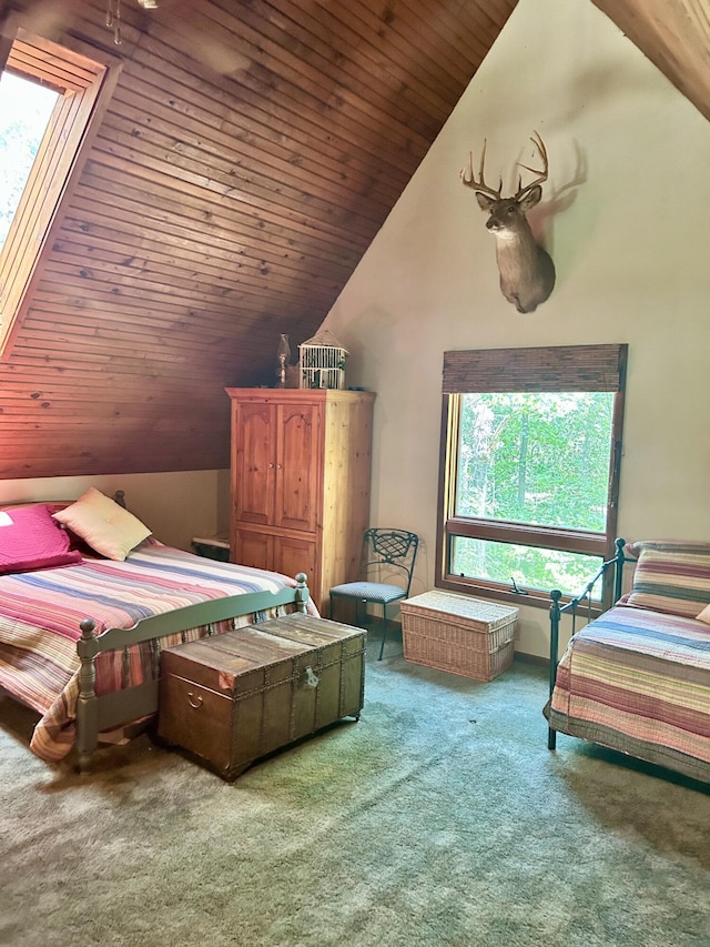 bedroom with carpet, wooden ceiling, and lofted ceiling