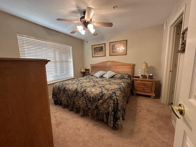 200 Glory Rd Unit C8, Branson, MO 65616 - bedroom with light carpet and ceiling fan