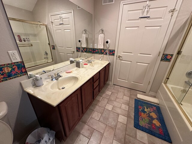 200 Glory Rd Unit C8, Branson, MO 65616 - bathroom with bath / shower combo with glass door and double vanity