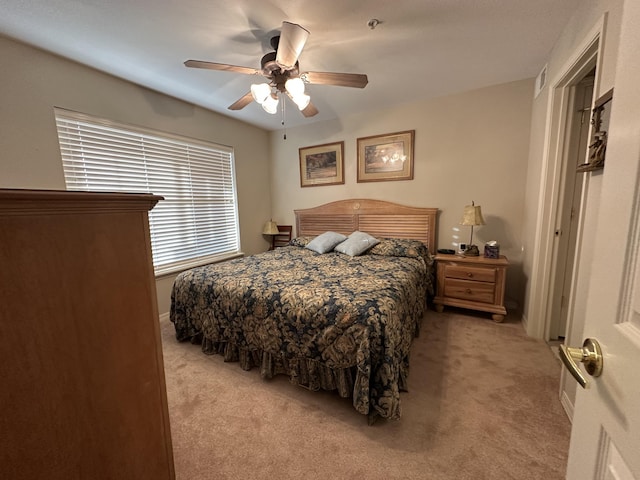200 Glory Rd Unit C8, Branson, MO 65616 - bedroom with light colored carpet and a ceiling fan