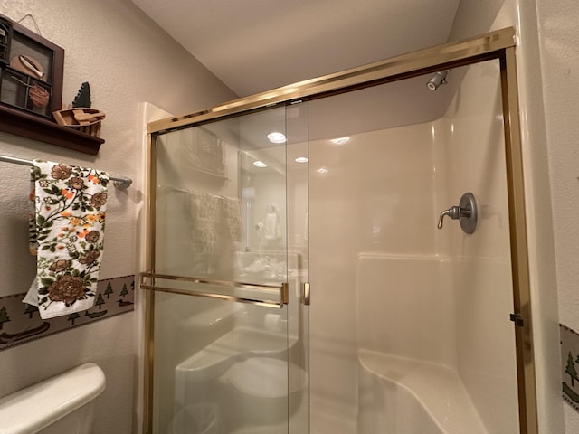 200 Glory Rd Unit C8, Branson, MO 65616 - bathroom with a textured wall and a stall shower