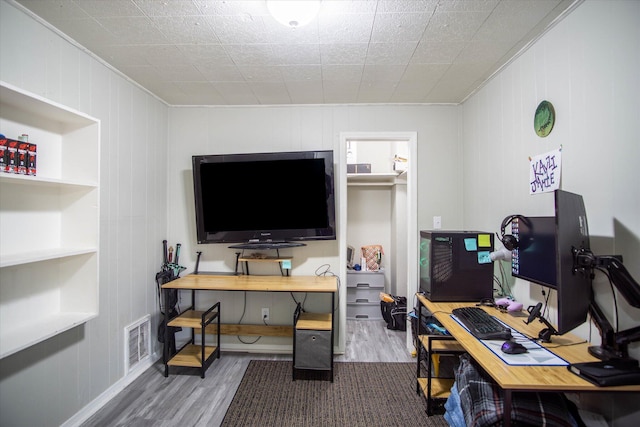 office area with wood-type flooring