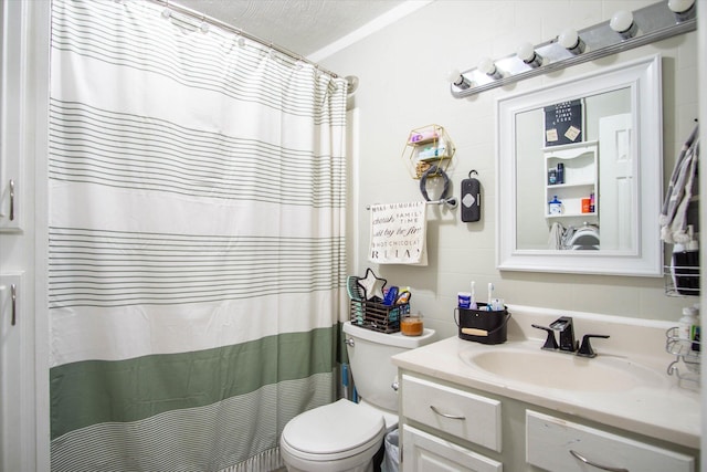 bathroom featuring vanity, walk in shower, and toilet