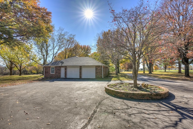 view of property exterior featuring a garage