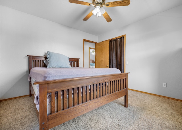 bedroom with ceiling fan and carpet