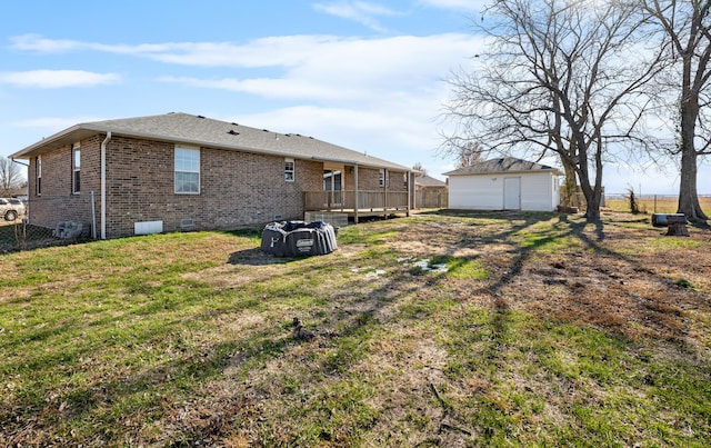 view of yard with a storage unit and a deck