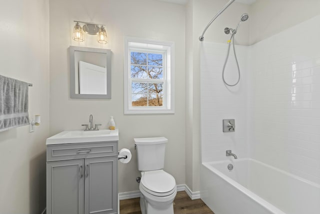 full bathroom with shower / bathing tub combination, vanity, toilet, and wood-type flooring