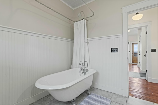 bathroom with hardwood / wood-style floors