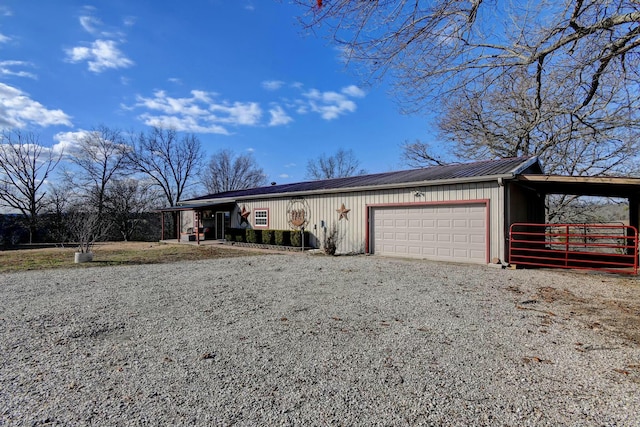 single story home featuring a carport