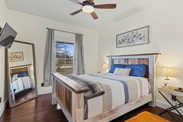 bedroom featuring ceiling fan and dark wood-type flooring