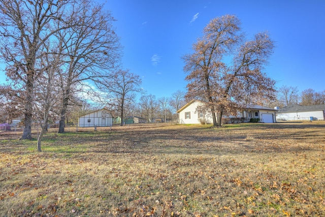 view of yard featuring a garage