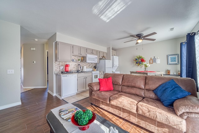 29 Fall Creek Dr Unit 2, Branson, MO 65616 - living room featuring ceiling fan, wood finished floors, and arched walkways