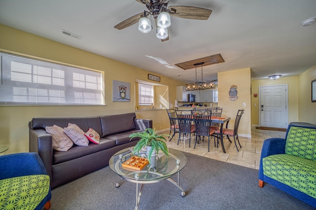 living room featuring ceiling fan