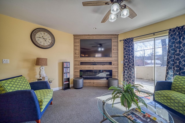 living room featuring ceiling fan and carpet