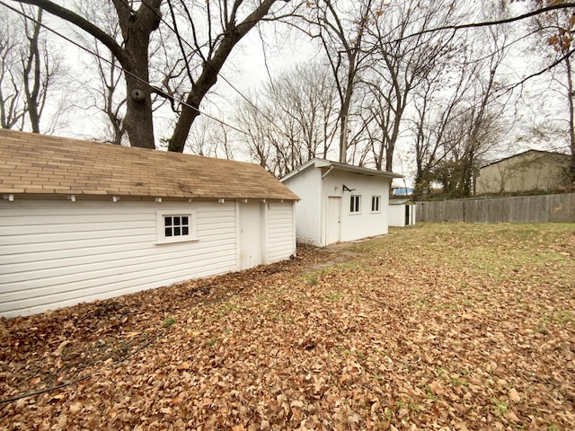 view of side of property featuring an outdoor structure