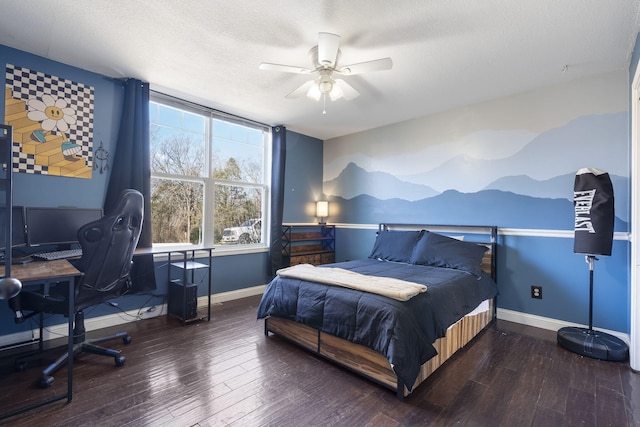 bedroom featuring a textured ceiling, ceiling fan, and dark wood-type flooring