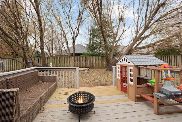 deck with a fire pit