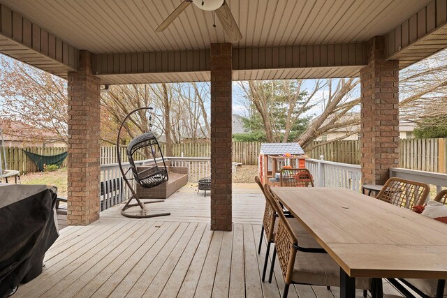 wooden terrace with ceiling fan