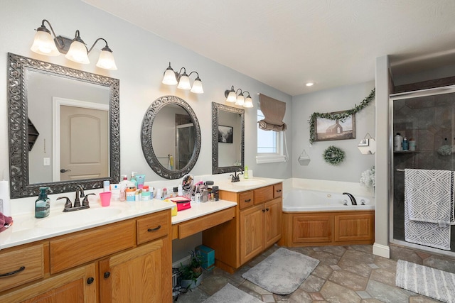 bathroom featuring vanity and separate shower and tub