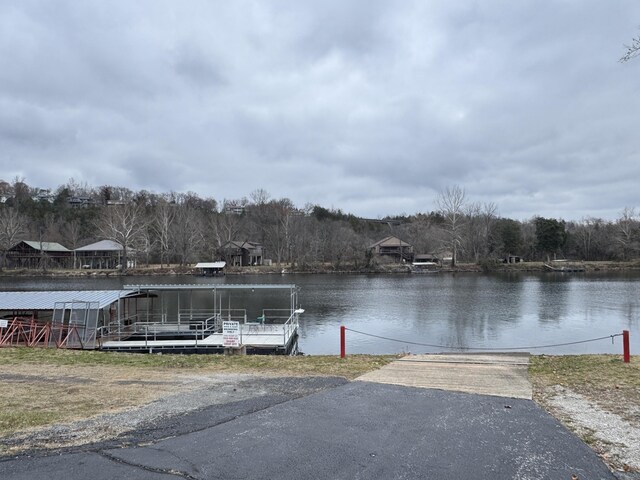 180 Wilshire Dr Unit 88, Hollister, MO 65672 - dock featuring a boat ramp and a water view