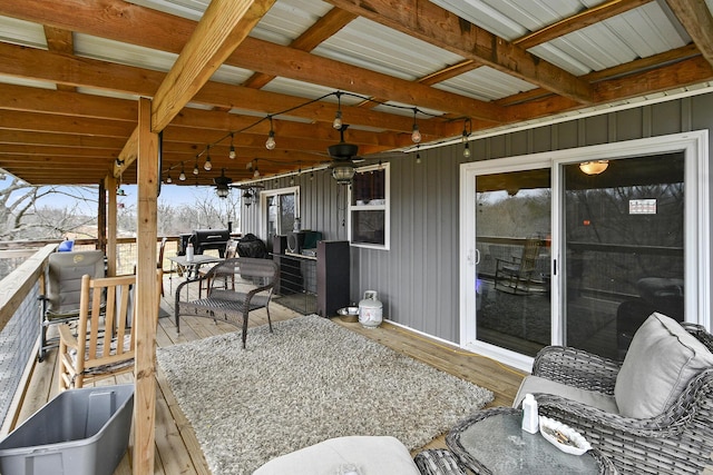 view of patio / terrace with ceiling fan and a wooden deck