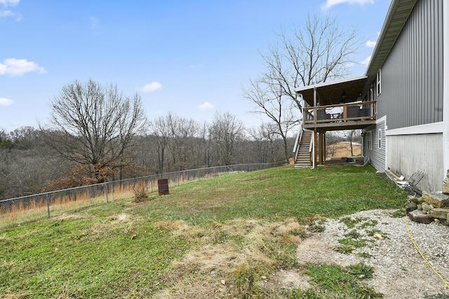 view of yard featuring a wooden deck