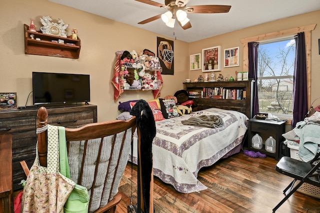 bedroom featuring wood-type flooring and ceiling fan