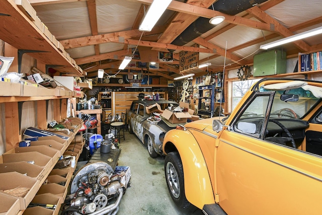 garage with a workshop area