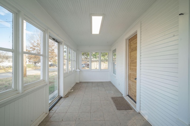 213 Mill St, Anderson, MO 64831 - unfurnished sunroom featuring wooden walls