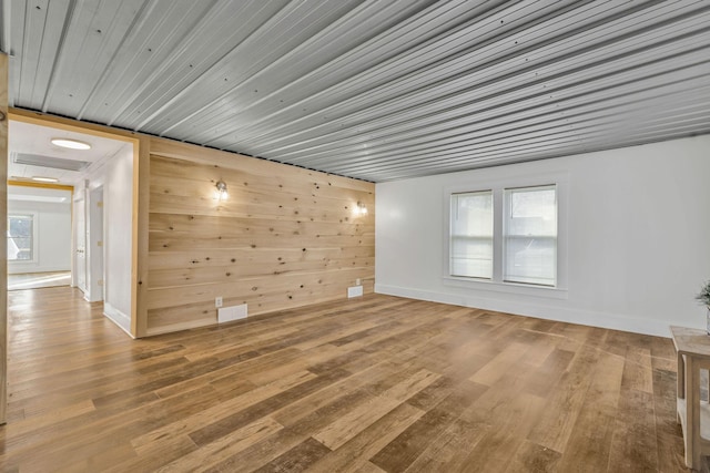 213 Mill St, Anderson, MO 64831 - empty room with wood finished floors and baseboards