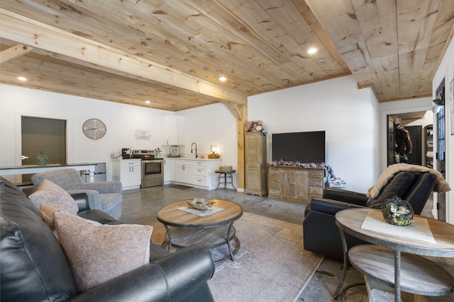 living room featuring wood ceiling, sink, and concrete flooring