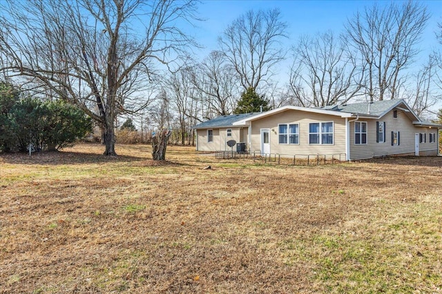 exterior space with a front lawn